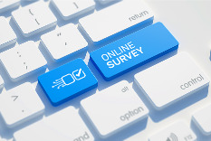 Image of keyboard keys one reads Online survey and one the left has a checkmark