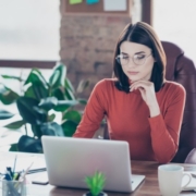 Image of business woman working at laptop